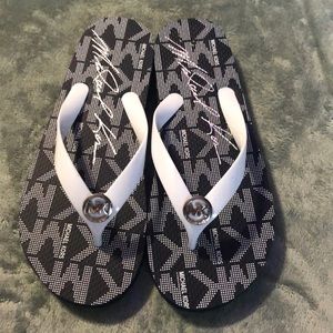 Navy blue Michael Kors flip flops